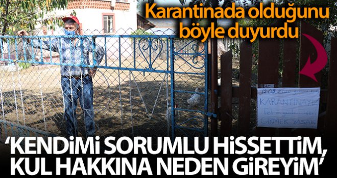 Karantinada olduğunu duyurmak için kapısına yazı yazdı